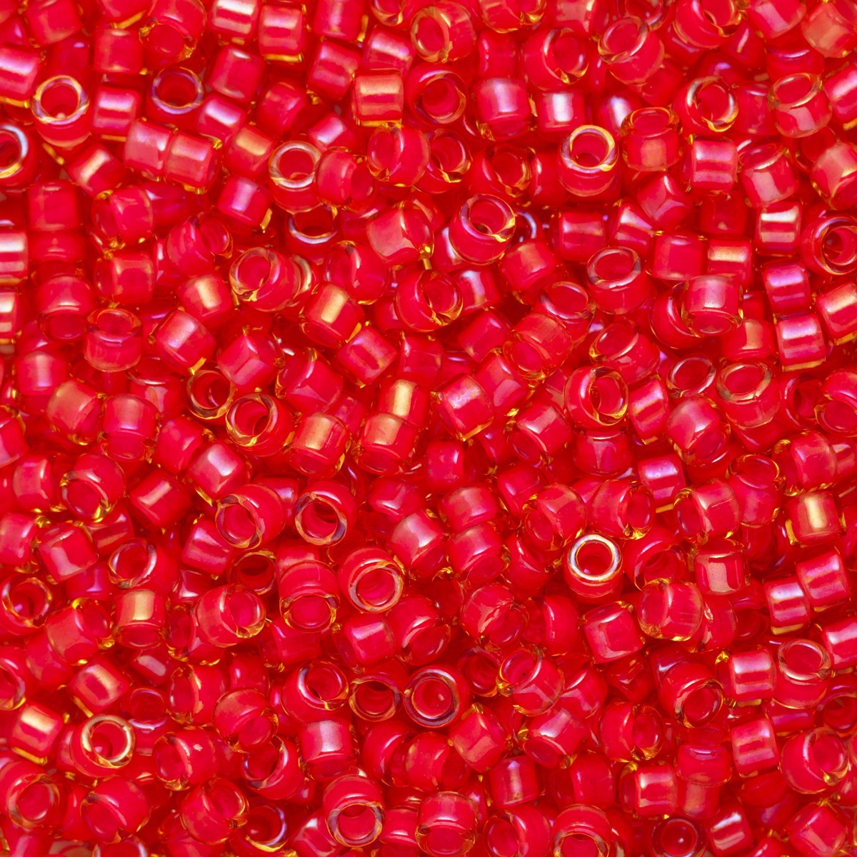 TOHO Treasure kralen - 11/0 - #979 neonrood transparant olie