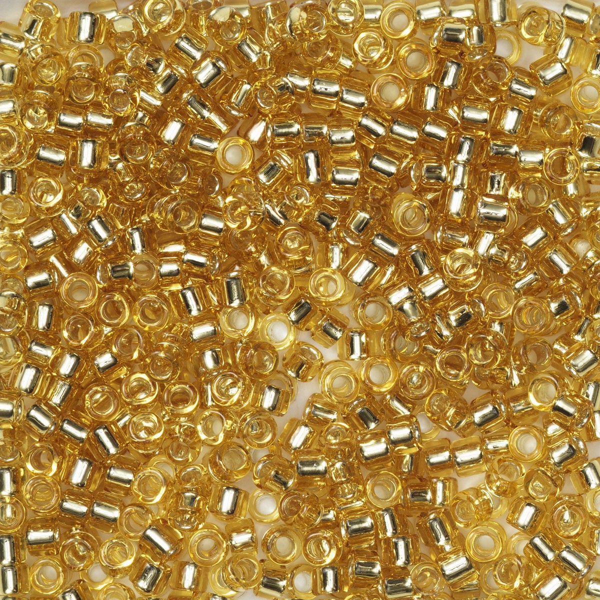 TOHO Round kralen - 11/0 - #22 goudkleurig transparant
