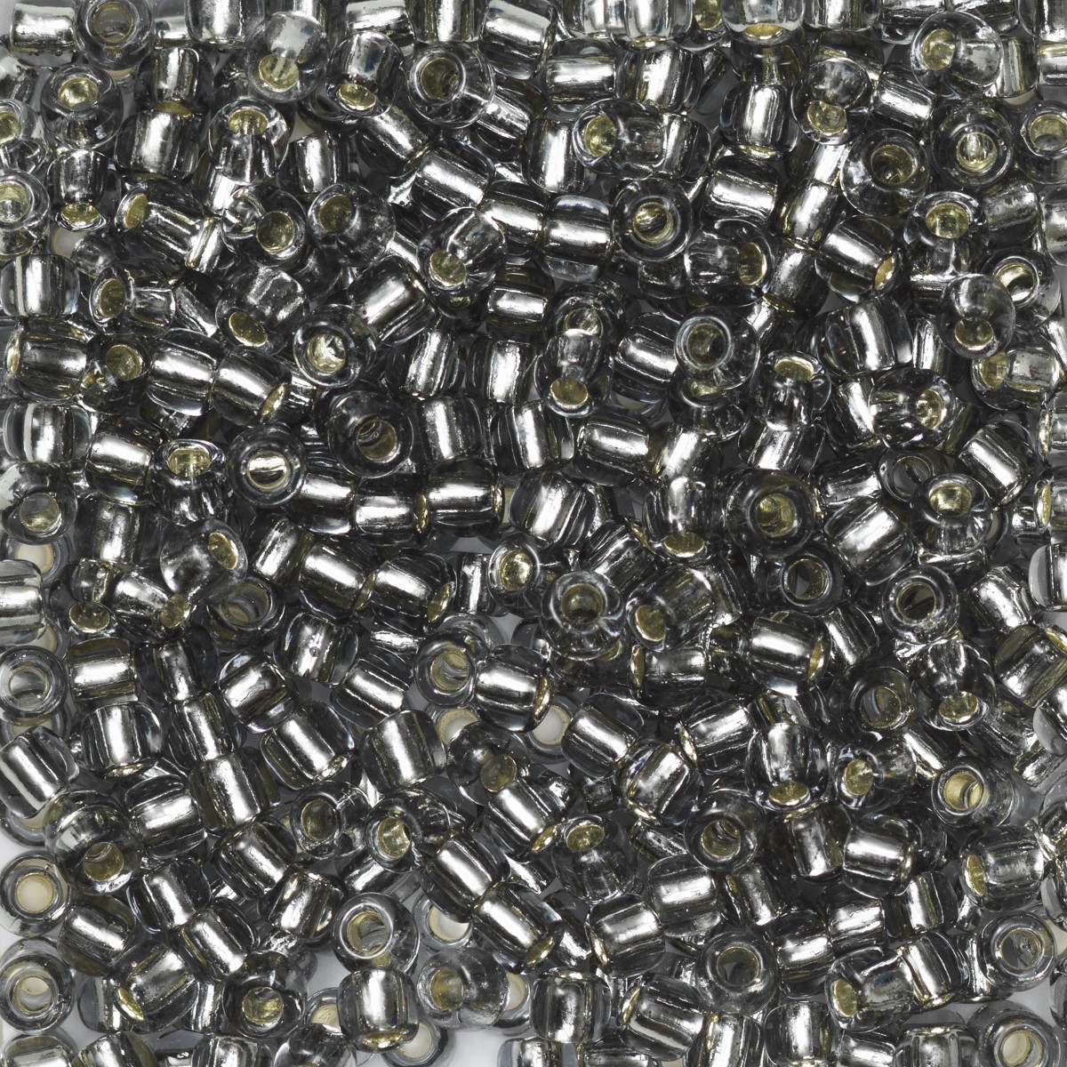 TOHO Round kralen - 11/0 - #29 grijs metaal kern transparant