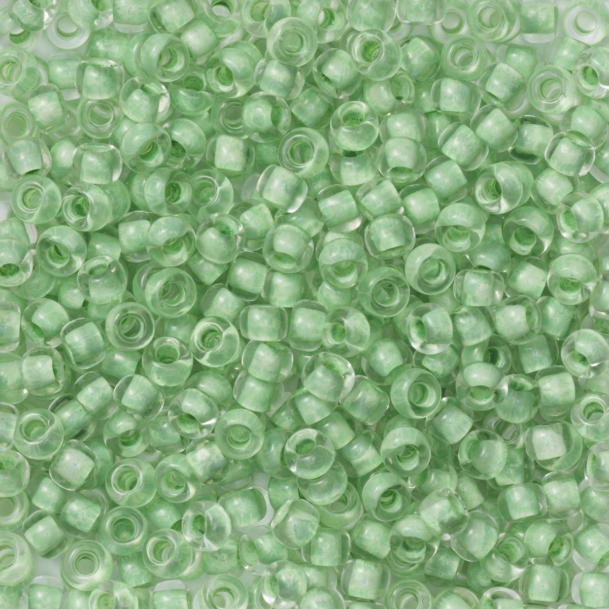 TOHO Round kralen - 11/0 - #975 appelgroene kern