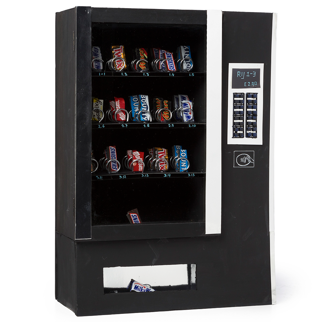 een snoepautomaat met chocorepen